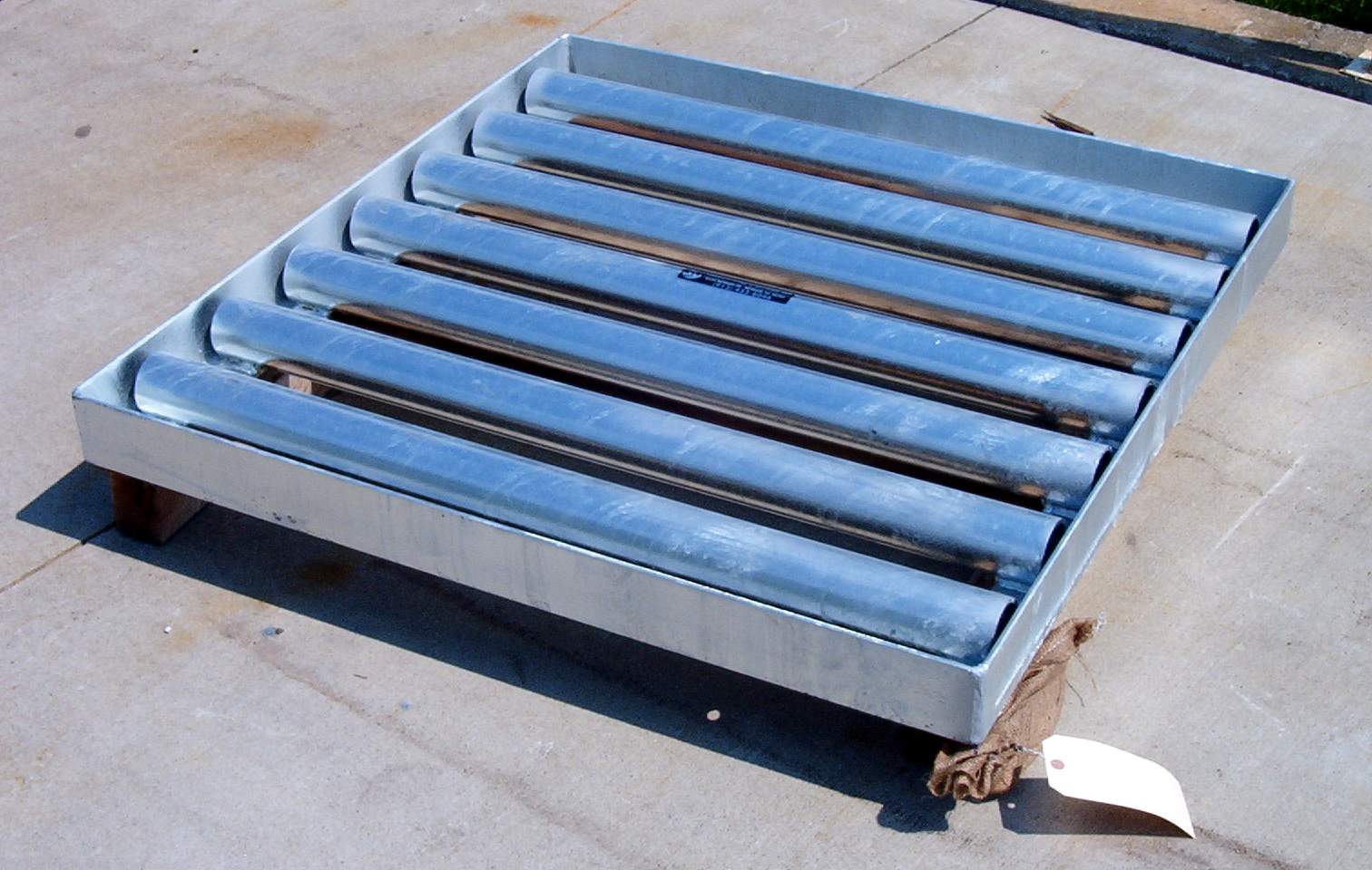 Steel pipe grate.